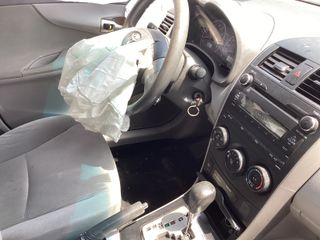 2010 Toyota Corolla LE - Interior Steering Wheel With Keys Image